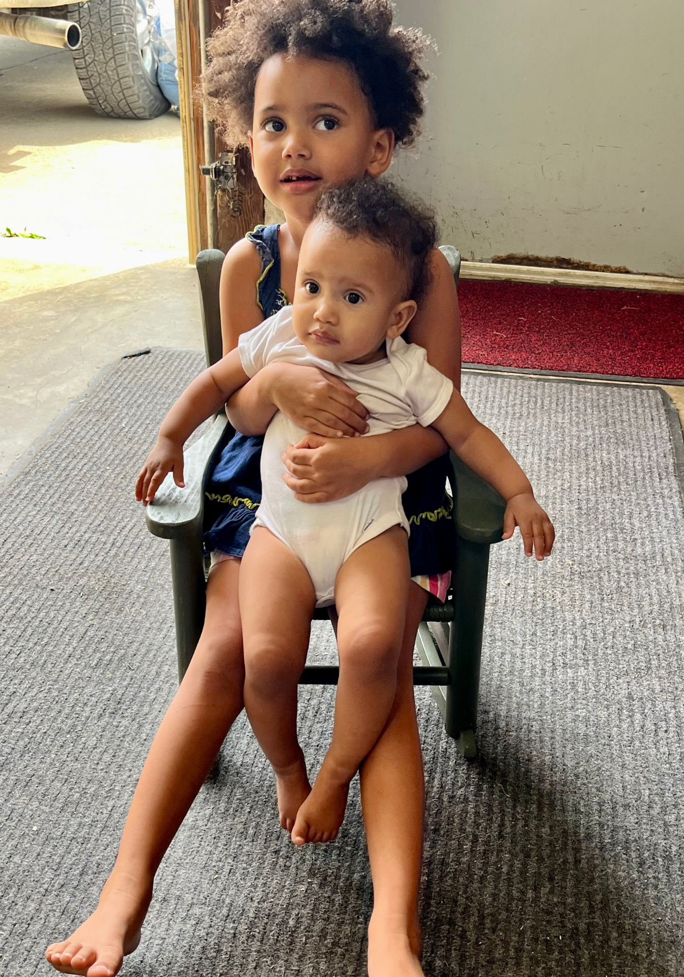 Kids Sitting in Chair
